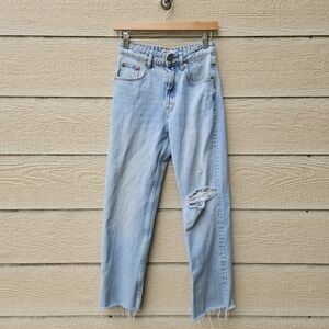 Zara light wash straight leg jeans with busted knee and raw hem size 2